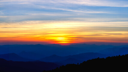 Obraz premium Sunset at peak mountain landscape