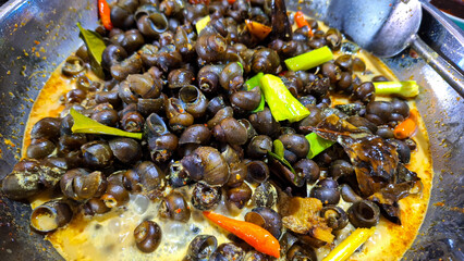 Tutut Stew, Traditional Food from Indonesia, Made from Tutut is a kind of freshwater slug. often...