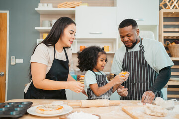 happy child family with father or mother cooking fun together for bakery bread meal in kitchen, young African little kid daughter girl and parent in love childhood lifestyle at home for food homemade - 763315581