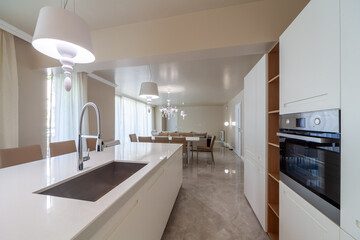 Fototapeta na wymiar New modern living room with kitchen. New home. Interior photography.