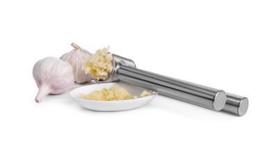 One metal press with garlic isolated on white
