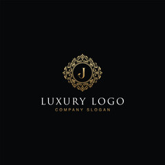 Luxurious elegant victorian floral filigree frame badge pattern with Initial letters J inside  circle badge emblem logo design vector in gold colors