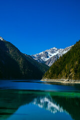 Jiuzhaigou Valley, Aba Qiang and Tibetan Autonomous Prefecture, Sichuan Province - beautiful lakes and mountains under the blue sky