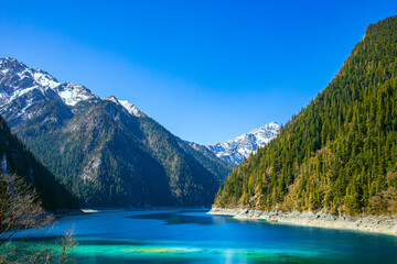 Jiuzhaigou Valley, Aba Qiang and Tibetan Autonomous Prefecture, Sichuan Province - beautiful lakes and mountains under the blue sky