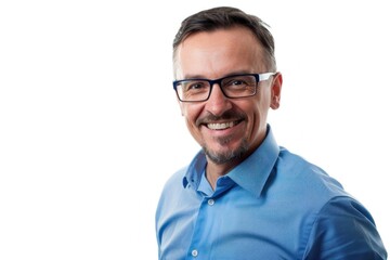 A happy handsome man in a blue shirt with glasses smiling at the camera isolated on a white background