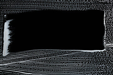 clear wiped stripe of soap foam on window glass, black and white  backgrond frame   