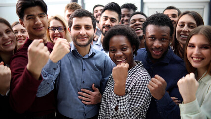 Obraz premium Confident diverse college students show fist up.