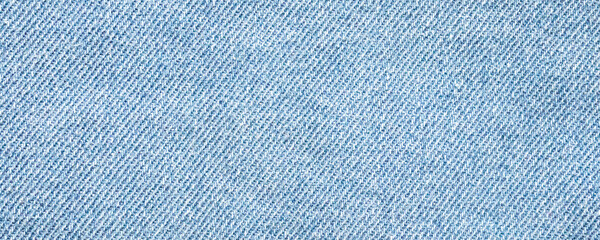 Old denim blue jeans fabric texture background