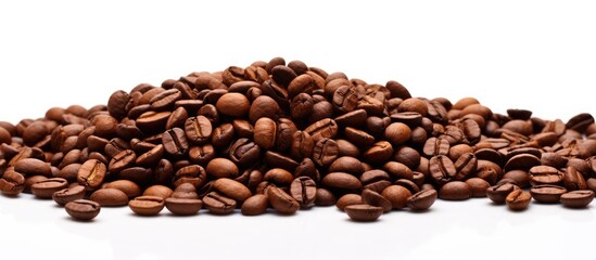 Fototapeta premium A pile of coffee beans on a white surface