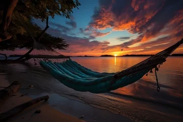 Fototapete Rund Relaxing tropical island vacation scene with hammock hanging under palm trees by the sea © anwel