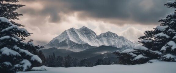 Mountain covered in snow under a cloudy sky
