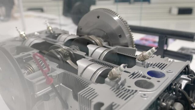 Air-cooled, four-cylinder, Boxer flat engine parts move display, retro-style, automotive passion, history automotive industry show in Germany