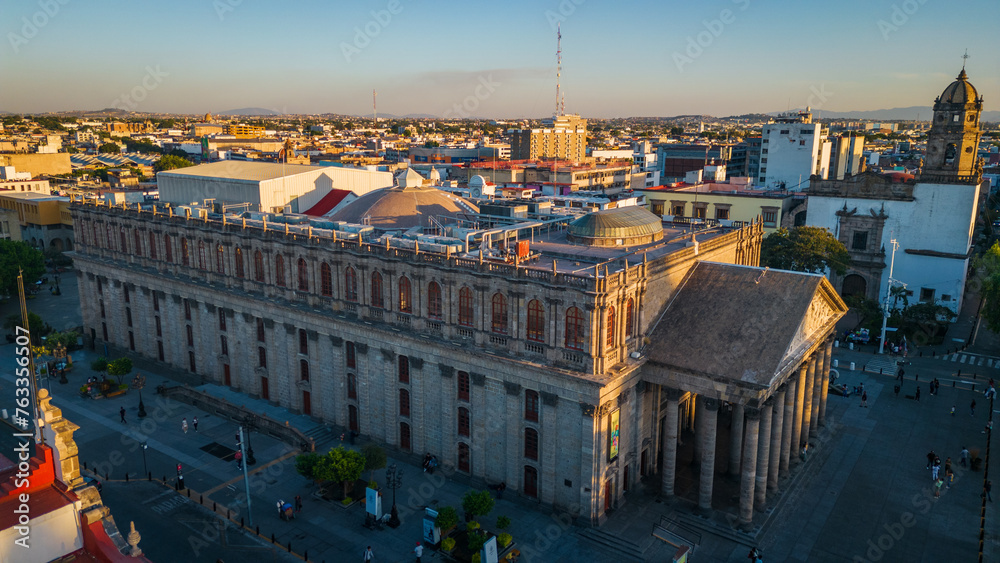 Wall mural drone rotate around main cathedral square at sunset in Guadalajara Jalisco capital cityscape Mexico aerial 