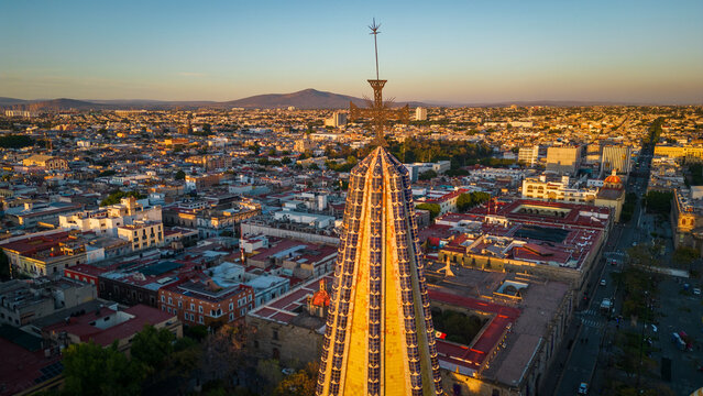 Fototapeta aerial Guadalajara Mexico jalisco capital cityscape with cross from main cathedral downtown historical at sunset 