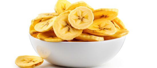 A bowl of ripe bananas on a wooden table