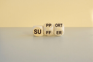 Suffer and support symbol. Turned wooden cubes and changes the word suffer to support. Beautiful...