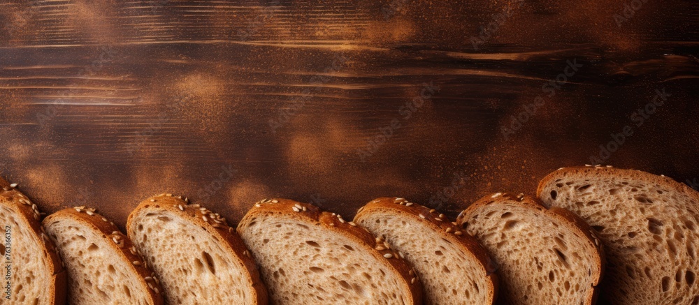 Poster slices of bread on a wooden table with a knife
