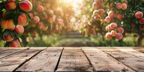 Foto op Canvas Empty wooden kitchen table over peach fruit garden background © Ricardo Costa