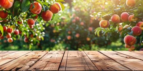 Keuken spatwand met foto Empty wooden kitchen table over peach fruit garden background © Ricardo Costa
