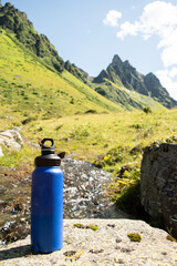 Sustainable Blue Water Bottle in Alpine Mountain Setting - 763379309