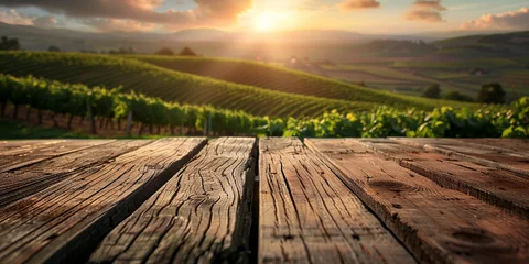 Foto op Canvas Wood table top on blurred vineyard landscape background © Ricardo Costa