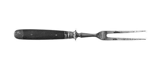 Old vintage meat fork isolated on white background.