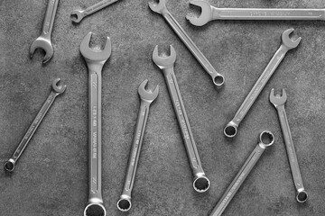 wrenches are scattered chaotically on the floor.