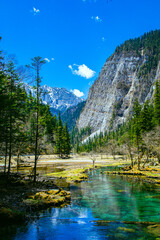 Jiuzhaigou Valley, Aba Qiang and Tibetan Autonomous Prefecture, Sichuan Province - beautiful lakes and mountains under the blue sky - obrazy, fototapety, plakaty
