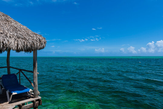 Pier of a hotel at Cayo Guillermo in the Jardines del Rey archipelago in the Caribbean and the horizon in the distance; Cayo Guillermo, Cuba
