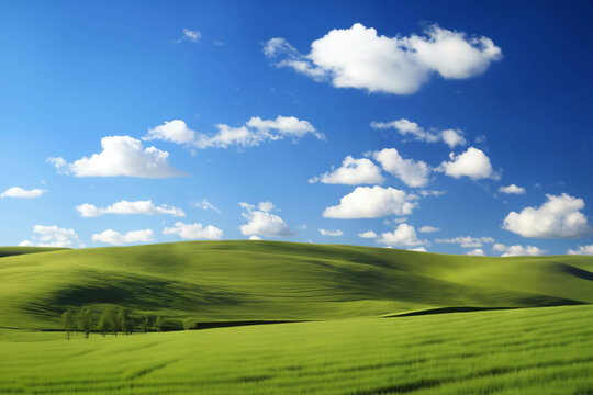 beautiful perfect landscape, green grass on the hills, green fields and sky with white clouds, bright sunlight and shadows