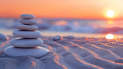 Tuinposter Zen rocks arranged artfully against a soft sunset backdrop © deafebrisa
