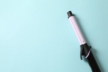 hair curler on a colored background