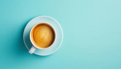 Foto op Plexiglas Cup of fresh coffee on blue background ©  ArtificialMango