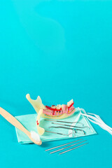 Tooth and dental tools for teeth. Medical dentist tool. Dentistry, healthcare, hygiene Concept.