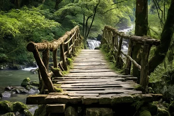 Poster Rustic wooden bridge connecting paths in a tranquil natural environment © KerXing