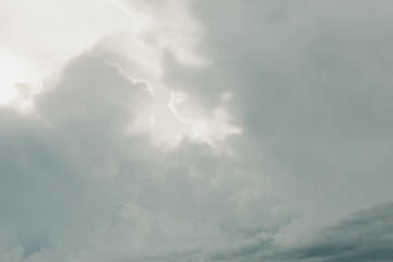 Clouds with sunlight shining through.