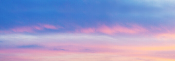 Evening sky with blue and pink clouds