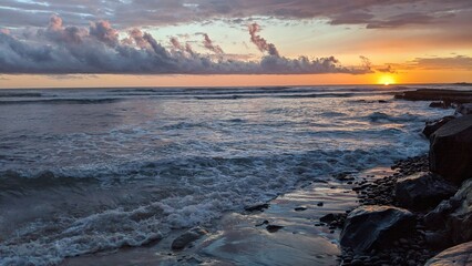 Southern California beaches, sunsets, surfers, tide pools and palms trees at Swamis Reef Surf Park...