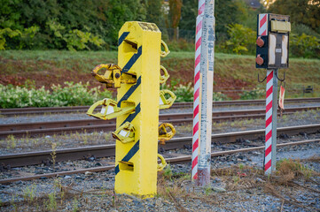 Fototapeta na wymiar Wheel chock on special holder. Austrian railways.