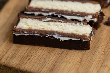 chocolate-covered sweet cookies with creamy cottage cheese
