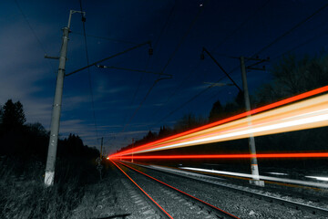 Train trails on railroad in the night