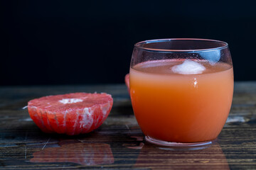 Juicy red grapefruit on the table