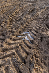 car tracks off-road in the field