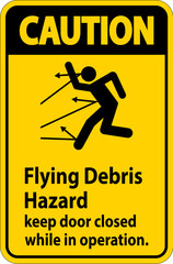 Caution sign indicating the risk of flying debris, advising to keep the door closed.