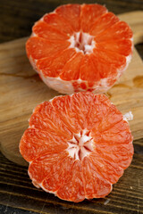 Juicy red grapefruit on the table
