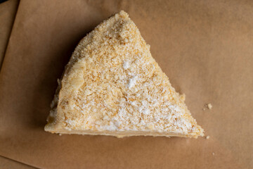 multi-layered cake made of buttercream and thin wheat cakes