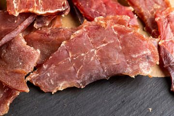 dried pork meat on the table in close-up