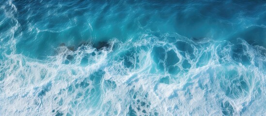Fototapeta na wymiar Aerial view of ocean wave crashing on rocks