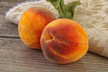 Two ripe sweet peaches fruit