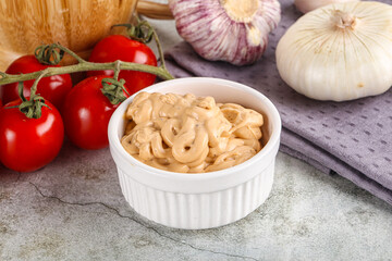 Yellow cream grill sauce for burger